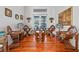 Unique sitting area with hardwood floors and ornate chairs at 1178 Black Walnut Ct, Winter Springs, FL 32708