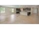 Open concept dining area with tile flooring and access to backyard at 121 S Cory Dr, Edgewater, FL 32141