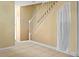 Basement hallway with staircase and tile flooring at 1930 Conway Rd # 2, Orlando, FL 32812