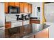 Modern kitchen with stainless steel appliances and granite countertops at 1930 Conway Rd # 2, Orlando, FL 32812