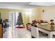 Living room with leather couch, Christmas tree and access to patio at 1930 Conway Rd # 2, Orlando, FL 32812