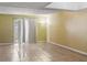 Bright living room featuring tile floors and sliding doors at 1930 Conway Rd # 2, Orlando, FL 32812