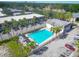 Communal pool with lounge chairs and a covered area at 1930 Conway Rd # 2, Orlando, FL 32812