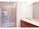 Double vanity bathroom with large shower and tile floor at 2825 Attwater Loop, Winter Haven, FL 33884