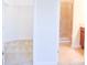 Bathroom features a shower and a walk-in closet at 2825 Attwater Loop, Winter Haven, FL 33884