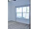 Spacious bedroom with large window and neutral carpeting at 2825 Attwater Loop, Winter Haven, FL 33884