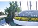 Elegant community entrance sign with landscaping at 2825 Attwater Loop, Winter Haven, FL 33884