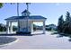 Gated community entrance with a charming guard house at 2825 Attwater Loop, Winter Haven, FL 33884