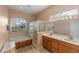 Double vanity bathroom with soaking tub and shower at 3954 Old Dunn Rd, Apopka, FL 32712