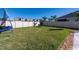 Spacious backyard with trampoline and partial pool view at 4381 Davos Dr, Clermont, FL 34711