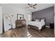 Spacious bedroom with wood flooring and dresser at 4381 Davos Dr, Clermont, FL 34711