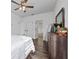 Comfortable bedroom with ensuite bathroom access at 4381 Davos Dr, Clermont, FL 34711