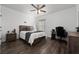 Bedroom with desk setup and ceiling fan at 4381 Davos Dr, Clermont, FL 34711