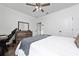 Bedroom with a dresser and ceiling fan at 4381 Davos Dr, Clermont, FL 34711