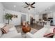 Open living area with contemporary furniture and kitchen view at 4381 Davos Dr, Clermont, FL 34711