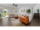 Bright living room featuring comfortable seating and stylish decor at 4381 Davos Dr, Clermont, FL 34711