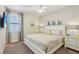 King bedroom with TV and window coverings at 471 Lasso Dr, Kissimmee, FL 34747
