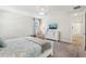 Bedroom with king bed, TV, and sitting area at 471 Lasso Dr, Kissimmee, FL 34747