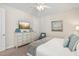 Bedroom with king-size bed, dresser, and mounted TV at 471 Lasso Dr, Kissimmee, FL 34747