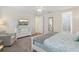 Bright bedroom featuring a comfortable king bed and en-suite bathroom at 471 Lasso Dr, Kissimmee, FL 34747