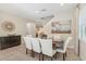 Bright dining room with a glass table and six chairs at 471 Lasso Dr, Kissimmee, FL 34747