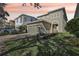 Two-story house with a two-car garage and beautifully landscaped yard at 471 Lasso Dr, Kissimmee, FL 34747
