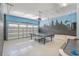 Finished garage with game table and mural at 471 Lasso Dr, Kissimmee, FL 34747