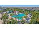 Relaxing pool area with lounge chairs and palm trees at 471 Lasso Dr, Kissimmee, FL 34747