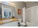 Clean bathroom with a tub, shower, and updated vanity at 608 Rum Run # 608, Davenport, FL 33897