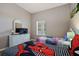 Bedroom with twin beds, dresser, and TV at 608 Rum Run # 608, Davenport, FL 33897