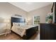 Main bedroom with king-size bed and window at 608 Rum Run # 608, Davenport, FL 33897