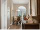 Bright dining area with arched entryway and seating for four at 608 Rum Run # 608, Davenport, FL 33897