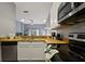 Kitchen with stainless steel appliances and breakfast bar at 608 Rum Run # 608, Davenport, FL 33897