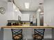 Kitchen with breakfast bar and modern cabinetry at 608 Rum Run # 608, Davenport, FL 33897
