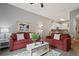 Open living room with adjacent kitchen and comfy seating at 608 Rum Run # 608, Davenport, FL 33897