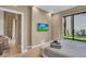 Comfortable bedroom with a king-size bed and view of the backyard at 7598 Brooklyn Dr, Kissimmee, FL 34747