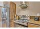 Stainless steel appliances and modern cabinetry highlight this kitchen at 7598 Brooklyn Dr, Kissimmee, FL 34747