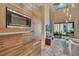 Open concept kitchen with wood cabinets and built-in microwave at 7598 Brooklyn Dr, Kissimmee, FL 34747