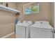 Convenient laundry room with washer and dryer at 7598 Brooklyn Dr, Kissimmee, FL 34747