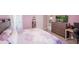 Bright bedroom with a comfortable bed and built-in desk at 7707 Country Pl, Winter Park, FL 32792