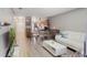 Open concept living area with white couch and dining table at 7707 Country Pl, Winter Park, FL 32792