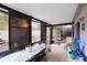 Relaxing screened porch with table and seating at 7707 Country Pl, Winter Park, FL 32792