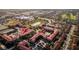 Condo building's aerial view highlighting its proximity to community features at 903 Charo Pkwy # 836, Davenport, FL 33897