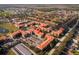 Aerial view showing condo location within a larger community with amenities at 903 Charo Pkwy # 836, Davenport, FL 33897