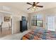 Comfortable bedroom with a queen-size bed and ample closet space at 903 Charo Pkwy # 836, Davenport, FL 33897