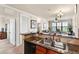 Kitchen features granite countertops and a double sink at 903 Charo Pkwy # 836, Davenport, FL 33897