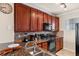 Well-equipped kitchen with ample cabinetry and granite countertops at 903 Charo Pkwy # 836, Davenport, FL 33897