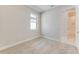 Bright bedroom with a door leading to the bathroom at 1273 Jackson Hole Ct, Deland, FL 32724