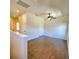 Spacious bedroom with wood-look floors and ceiling fan at 1720 Crocker Ave, Orlando, FL 32806