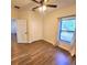 Bedroom with hardwood floors and double door closet at 1720 Crocker Ave, Orlando, FL 32806